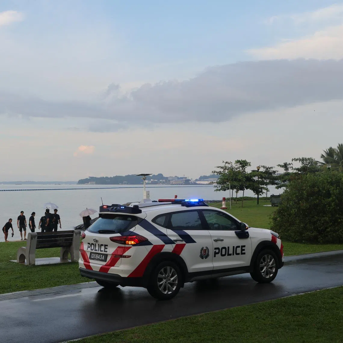 A police vehicle seen at the beach near Carpark D at Pasir Ris Park at 6.30pm on July 5, after a lightning strike incident was reported earlier.