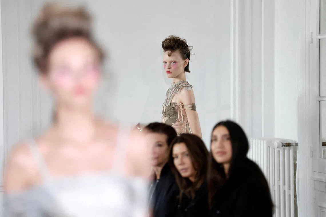 Models presenting creations by designer Victor Weinsanto as part of his Spring/Summer 2026 Women's ready-to-wear collection show for fashion brand Weinsanto during Paris Fashion Week in Paris, France, Sept 29, 2025. 