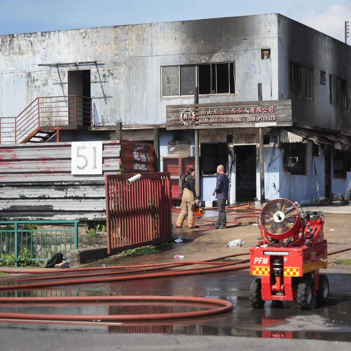 The fire at 51 Sungei Kadut Street 1 involved wooden materials and was extinguished with two water jets by SCDF.