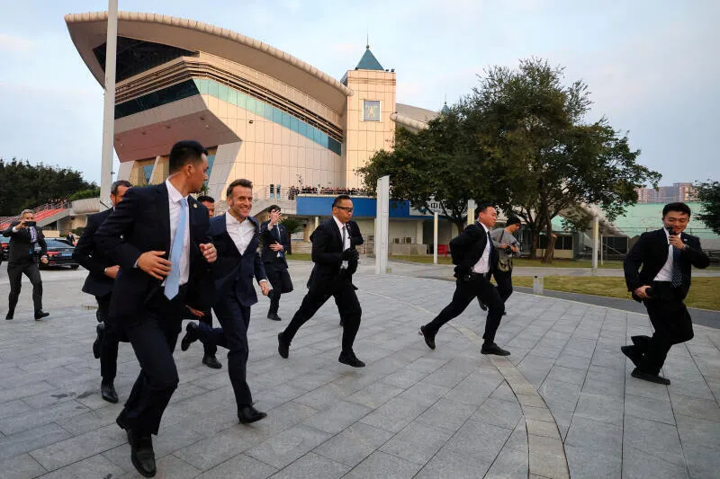 China's Sichuan University, which French President Emmanuel Macron (second from left) visited recently, has overtaken known names like Stanford, MIT and Oxford in high quality scientific research output.