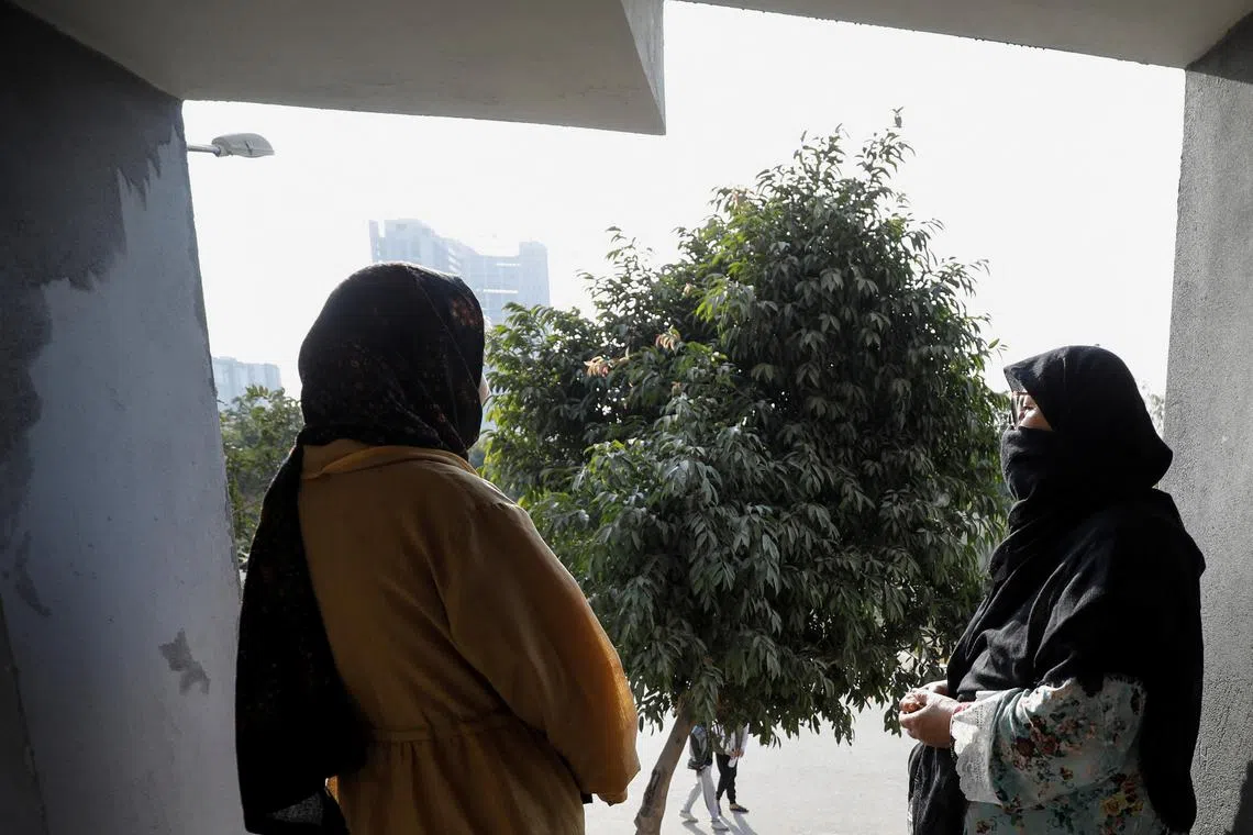 An Afghan citizen Fatima, 57, and her 15-year-old daughter, who are in the process for resettlement in the U.S. pose during an interview with Reuters on the outskirts of Islamabad, Pakistan January 22, 2025. REUTERS/Salahuddin