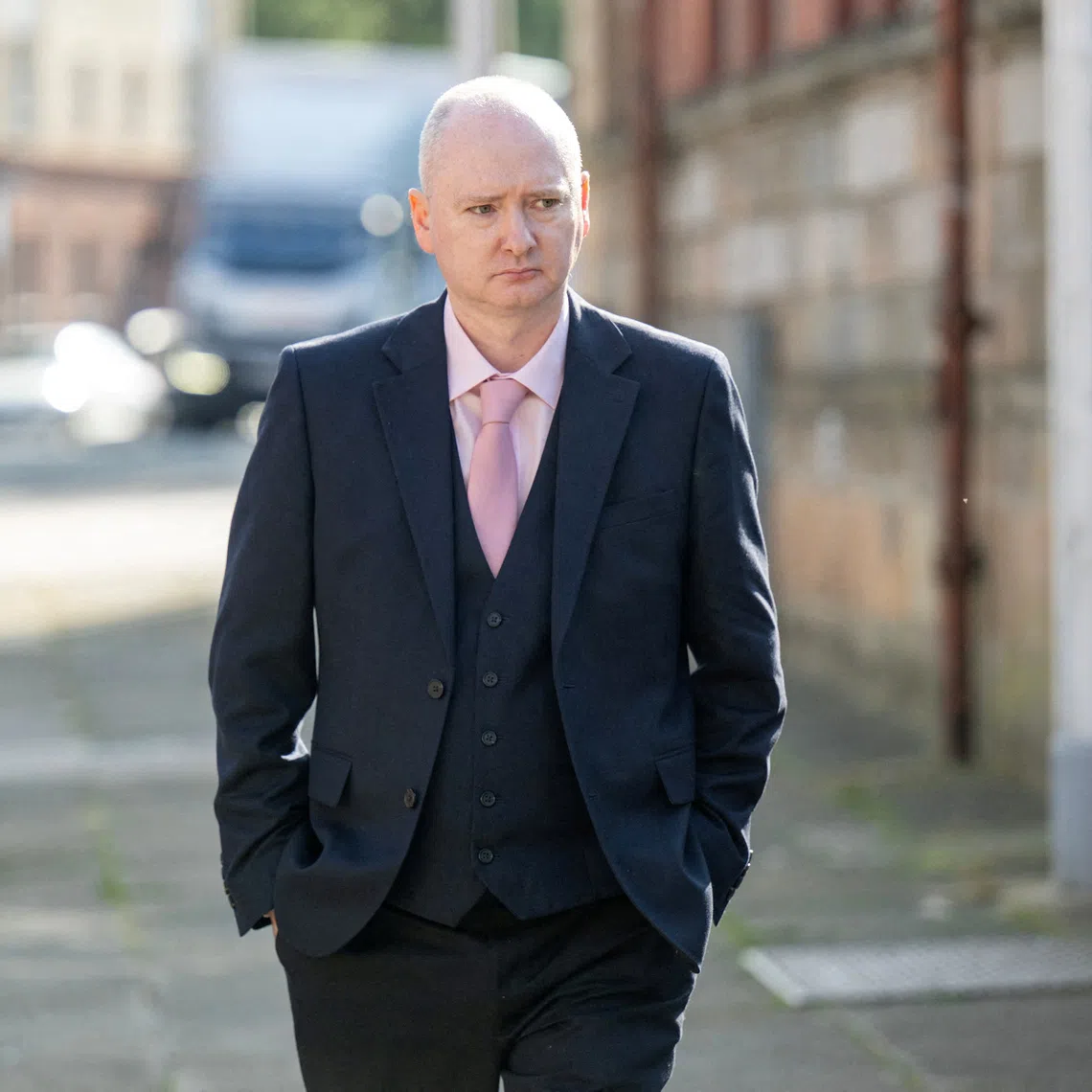 Former snooker world champion Graeme Dott, who is accused of sexually abusing two children between 1993 and 2010, arrives at the High Court in Glasgow, Scotland, Britain, August 24, 2026. REUTERS/Lesley Martin