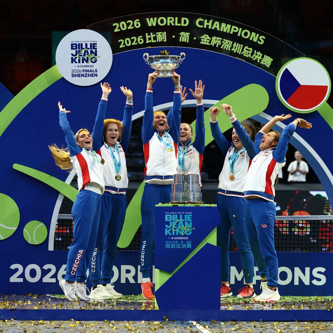 Tennis - Billie Jean King Cup Finals - Final - Ukraine v Czech Republic - Shenzhen Bay Sports Centre Arena, Shenzhen, China - September 27, 2026  Czech Republic's Linda Noskova, Karolina Muchova, Marie Bouzkova, Katerina Siniakova, captain Barbora Strycova, and a teammate celebrate with the Billie Jean King Cup after winning their final matches against Ukraine REUTERS/Tingshu Wang