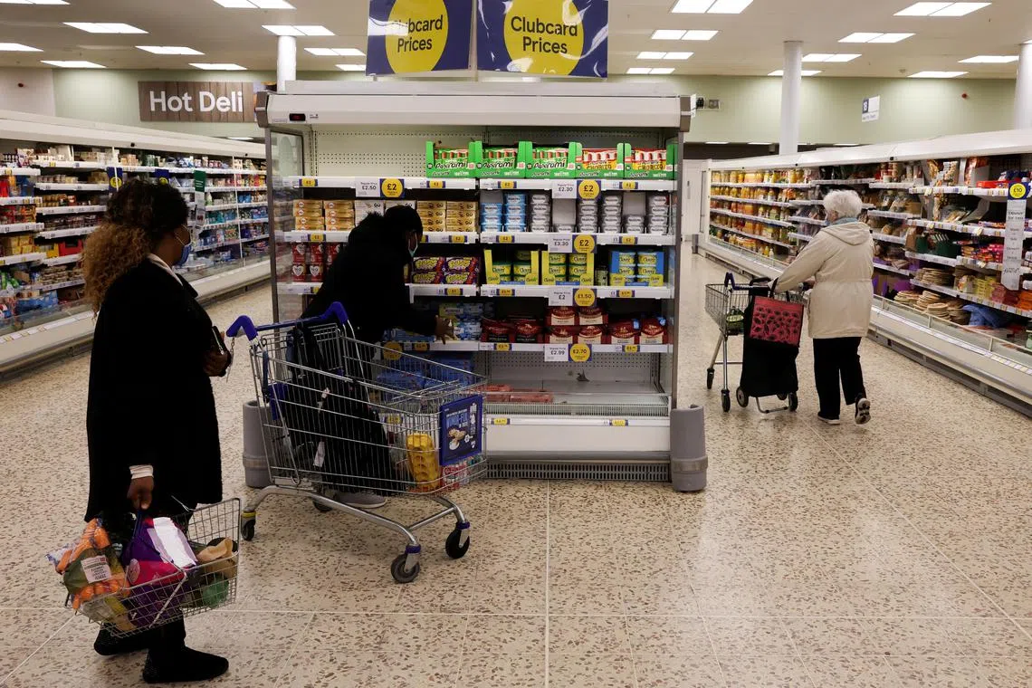 Younger households with smaller financial cushions are cutting back the most in Britain's cost-of-living crisis.