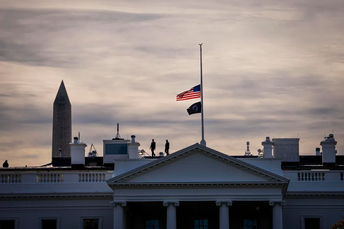 The American flag flies at half staff in honour of former Vice-President Dick Cheney at the White House on Nov 4.  