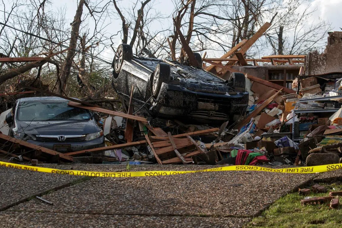 More than 20 people were killed when a violent storm ripped through Southern and Midwestern sections of the US.