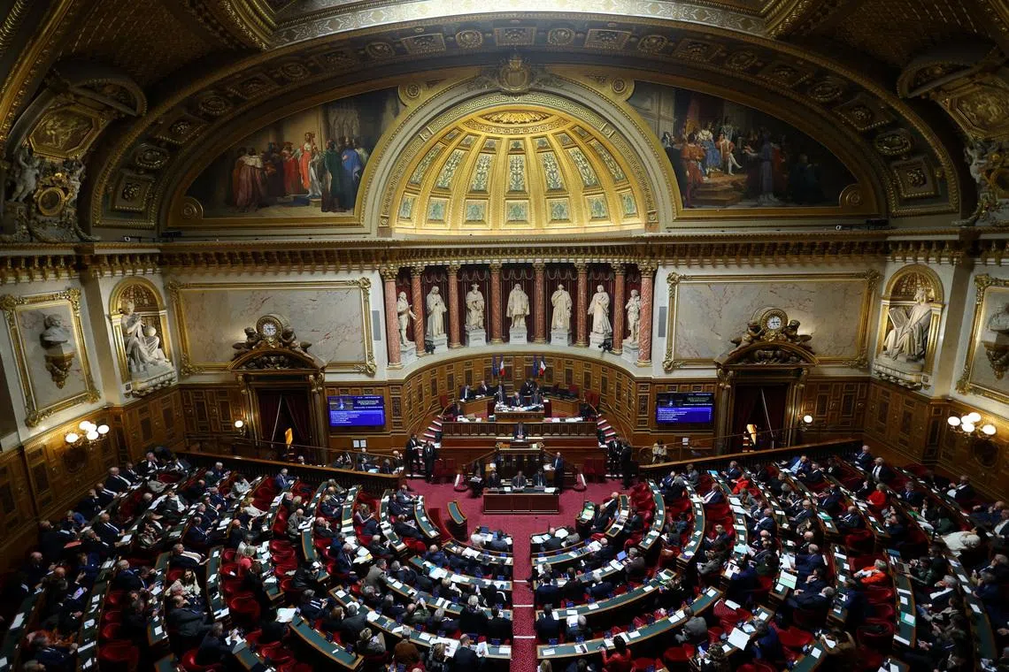 FILE PHOTO: A general view shows the hemicycle during a session before a vote on a draft budget bill for 2026 (PLF 2026) at the French Senate in Paris, France, December 15, 2025. REUTERS/Sarah Meyssonnier/File Photo