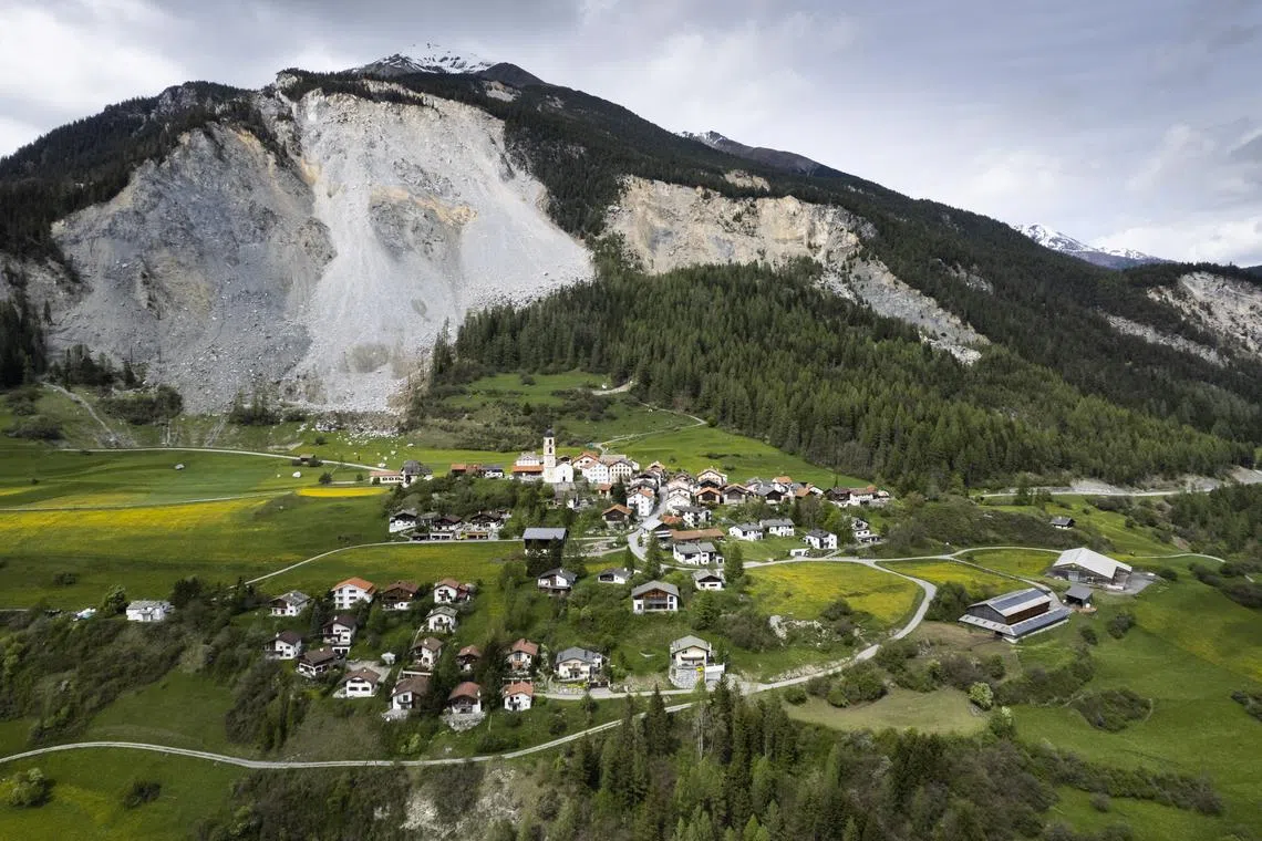 View of the village and the "Brienzer Rutsch" on May 9, in Brienz-Brinzauls, Switzerland. The municipality has closed the access road to the village; residents must evacuate their homes by Friday evening due to an impending rockslide. Two million cubic metres of rock from the mountain above is predicted to come loose and crashing to the valley in the next few days. 