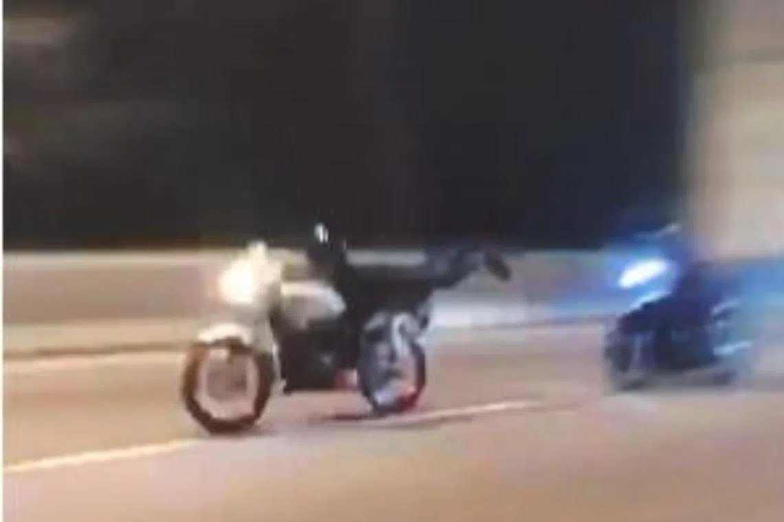 Footage show two bikers going at high speed along the Tun Dr Lim Chong Eu expressway.