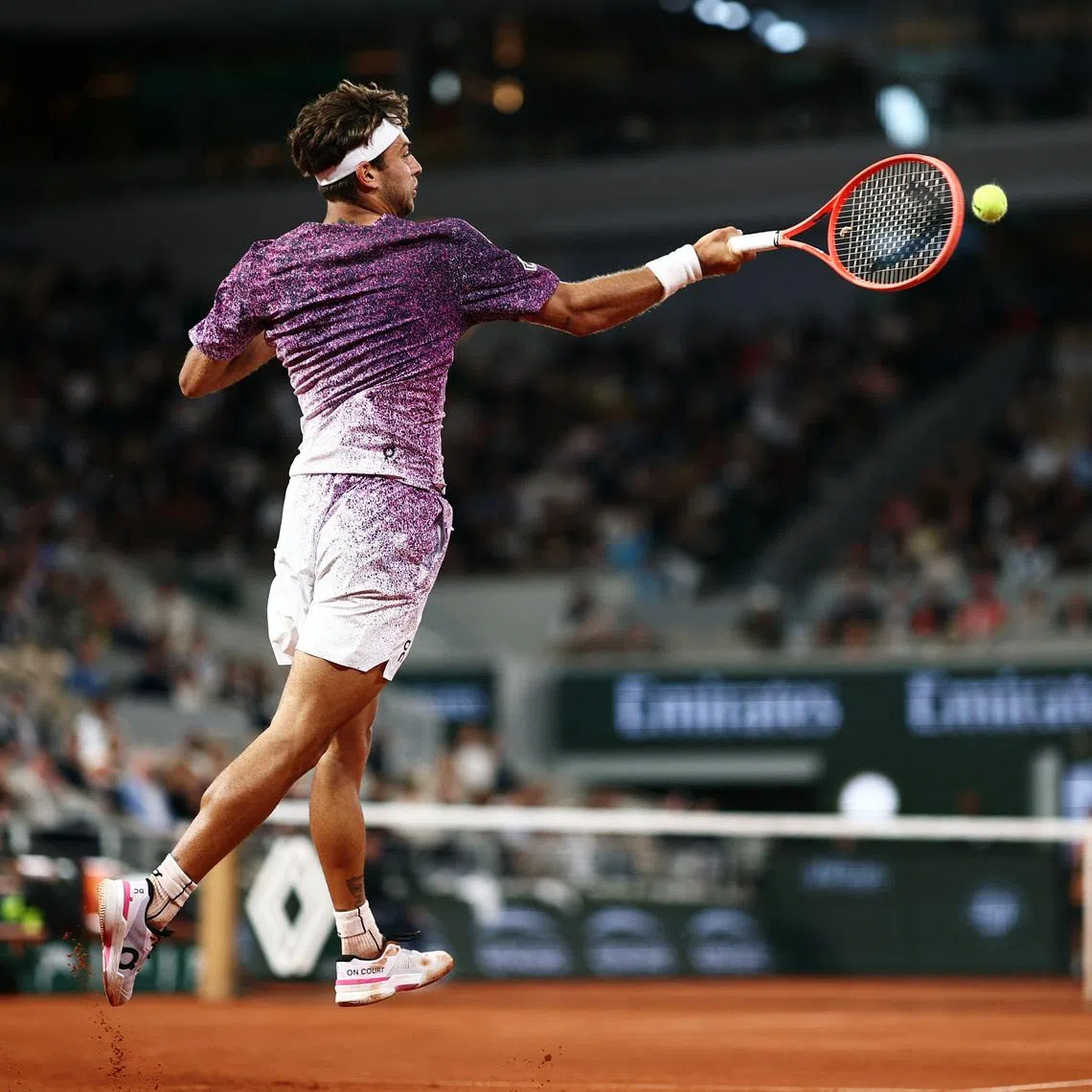 Italy's Flavio Cobolli in action during his 4-6, 6-4, 6-4, 6-4 French Open quarter-final win over Canada's Felix Auger-Aliassime at Roland Garros on June 3.