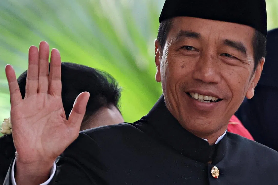 FILE PHOTO: Indonesian President Joko Widodo waves to journalists as he enters the parliament building before delivering the annual State of the Nation Address, ahead of the country's Independence Day, in Jakarta, Indonesia, August 16, 2024. REUTERS/Ajeng Dinar Ulfiana/Pool/File Photo