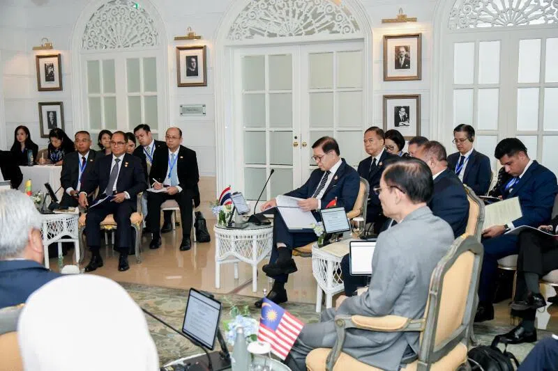 Thailand's Foreign Minister Sihasak Phuangketkeow and Myanmar's Foreign Minister Tin Maung Swe attend an informal meeting with ASEAN Foreign Ministers in Bangkok, Thailand, July 12, 2026. Thailand Ministry of Foreign Affairs/Handout via REUTERS ATTENTION EDITORS - THIS IMAGE HAS BEEN SUPPLIED BY A THIRD PARTY. MANDATORY CREDIT. NO RESALES. NO ARCHIVES.