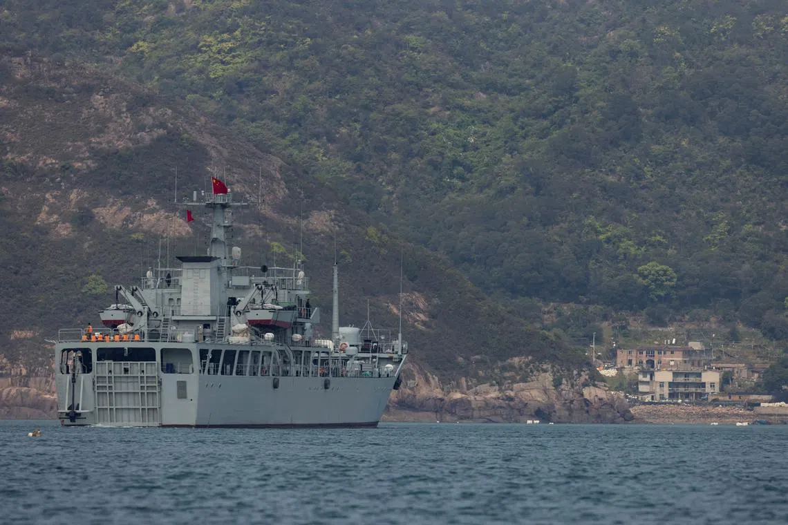 A Chinese warship takes part in a military drill off the Chinese coast near Fuzhou, Fujian Province, across from the Taiwan-controlled Matsu Islands, China, April 11, 2023. REUTERS/Thomas Peter