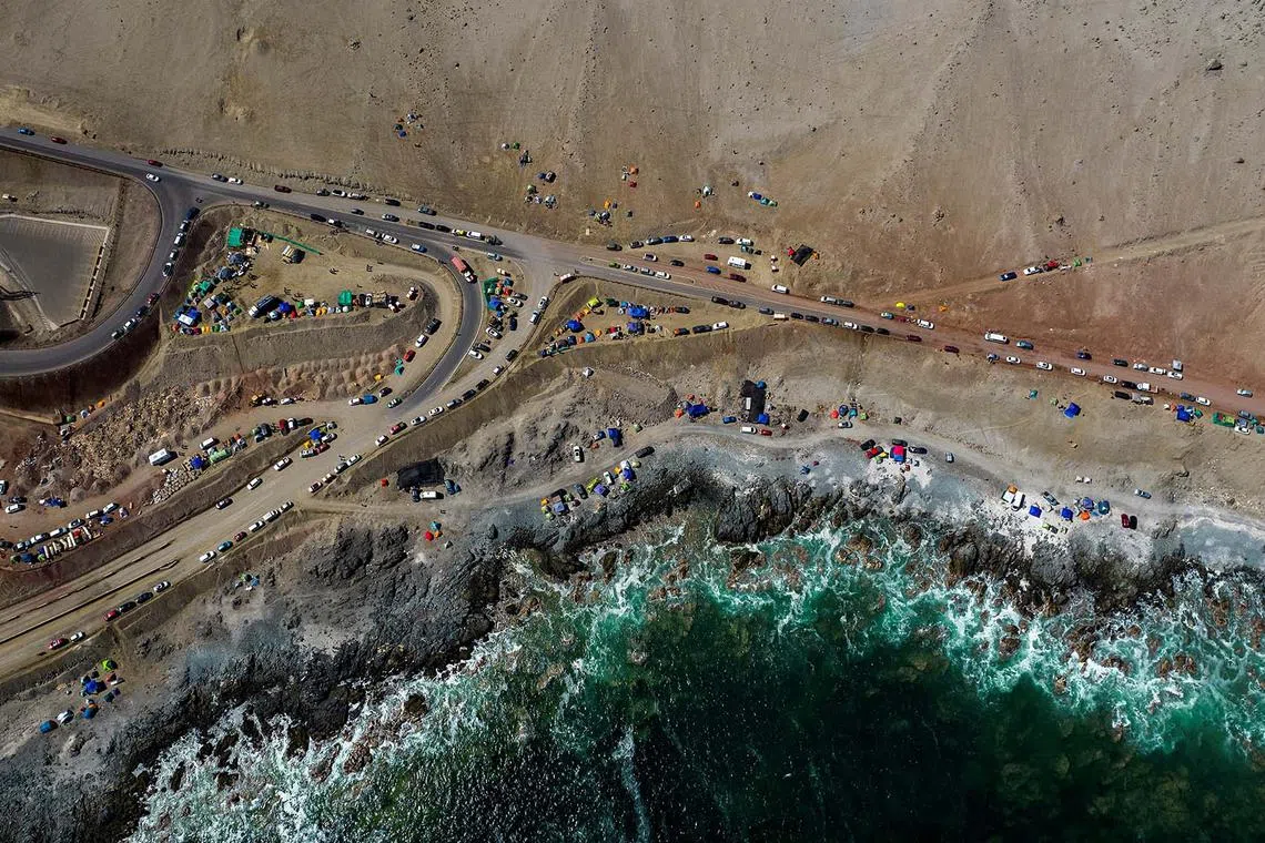 A drone view shows workers on strike from BHP's Escondida copper mine, camping close to 'Coloso' port owned by the copper company, in Antofagasta, Chile August 15, 2024. REUTERS/Cristian Rudolffi TPX IMAGES OF THE DAY