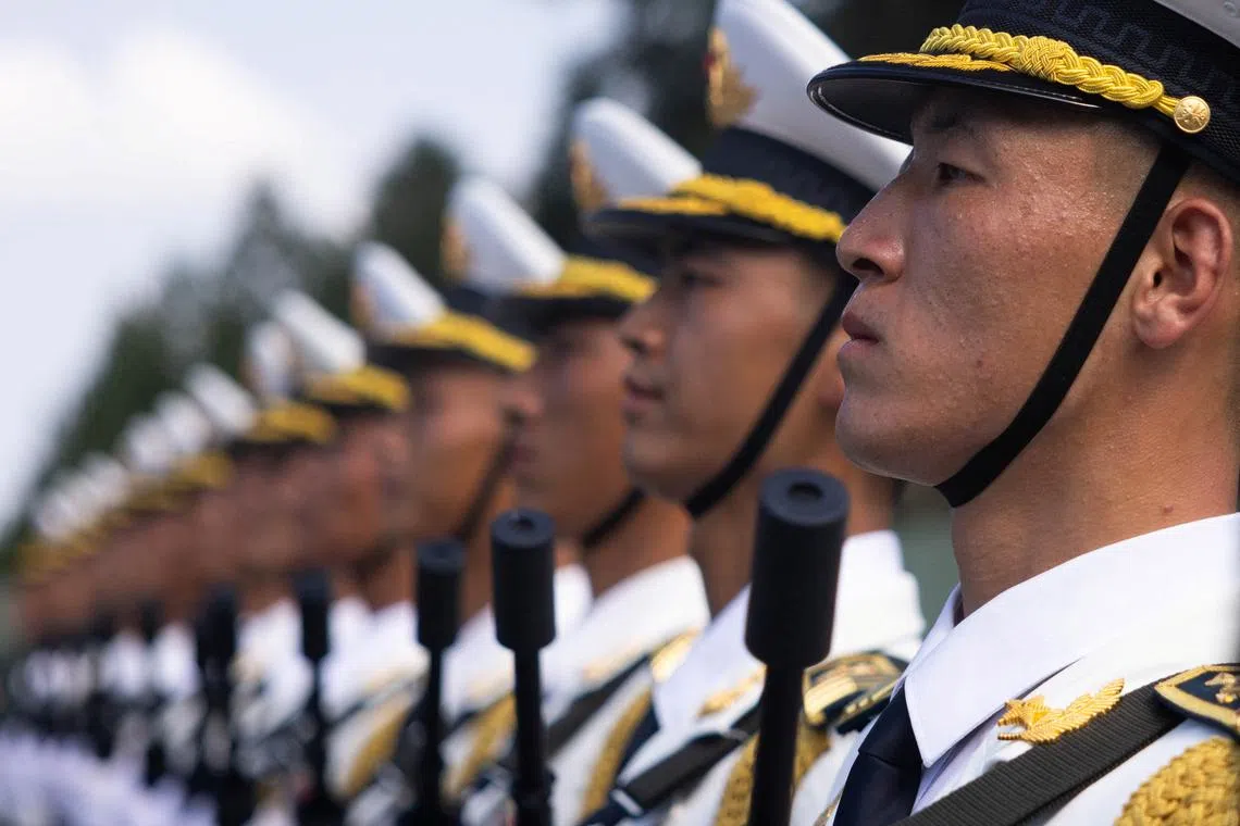 Soldiers of the People's Liberation Army (PLA) of China attend a training ahead of a military parade to mark the 80th anniversary of the end of World War Two, in Beijing, China, August 20, 2025. REUTERS/Maxim Shemetov