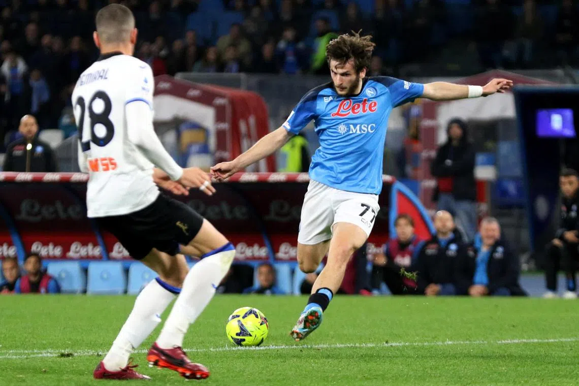 Napoli midfielder Khvicha Kvaratskhelia scores the first goal in the 2-0 win over Atalanta.