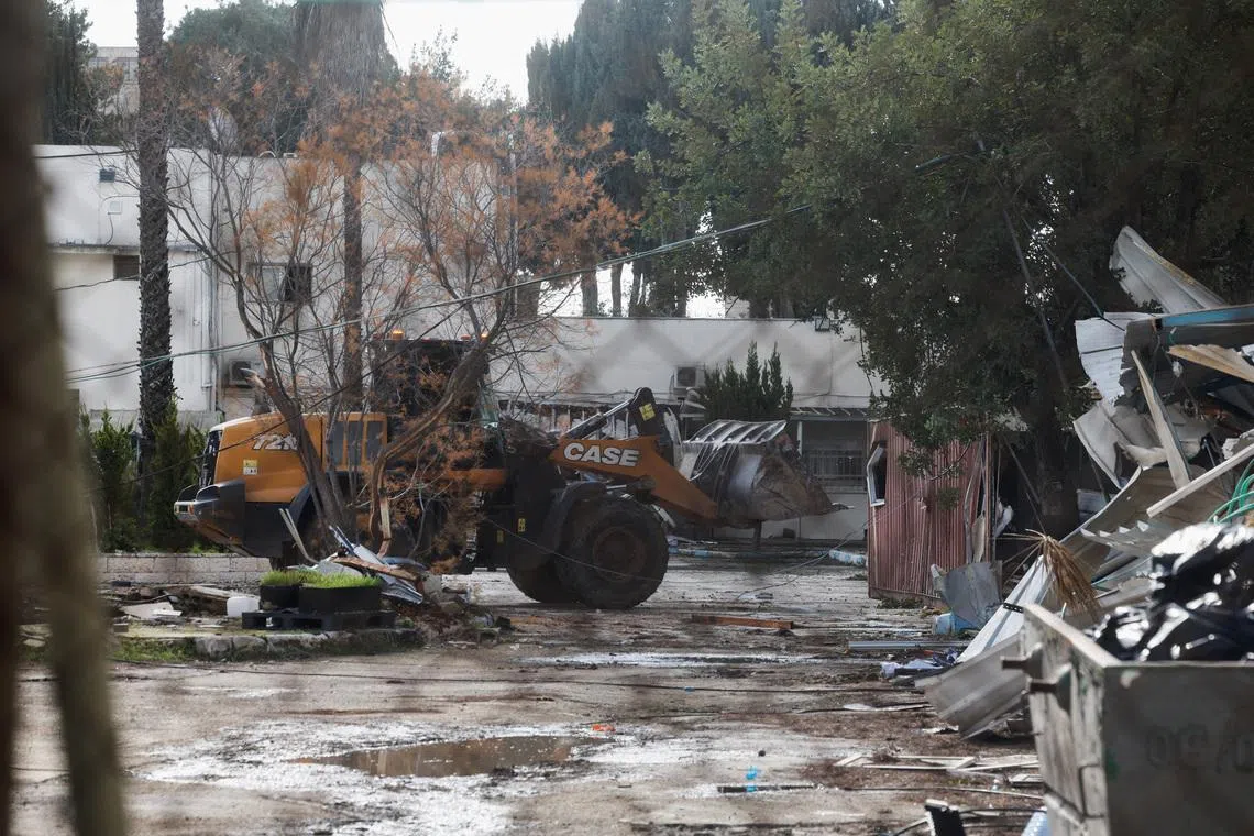 Israeli forces dismantle the Jerusalem headquarters of the United Nations Relief and Works Agency for Palestine Refugees (UNRWA), in East Jerusalem, on Jan 20.
