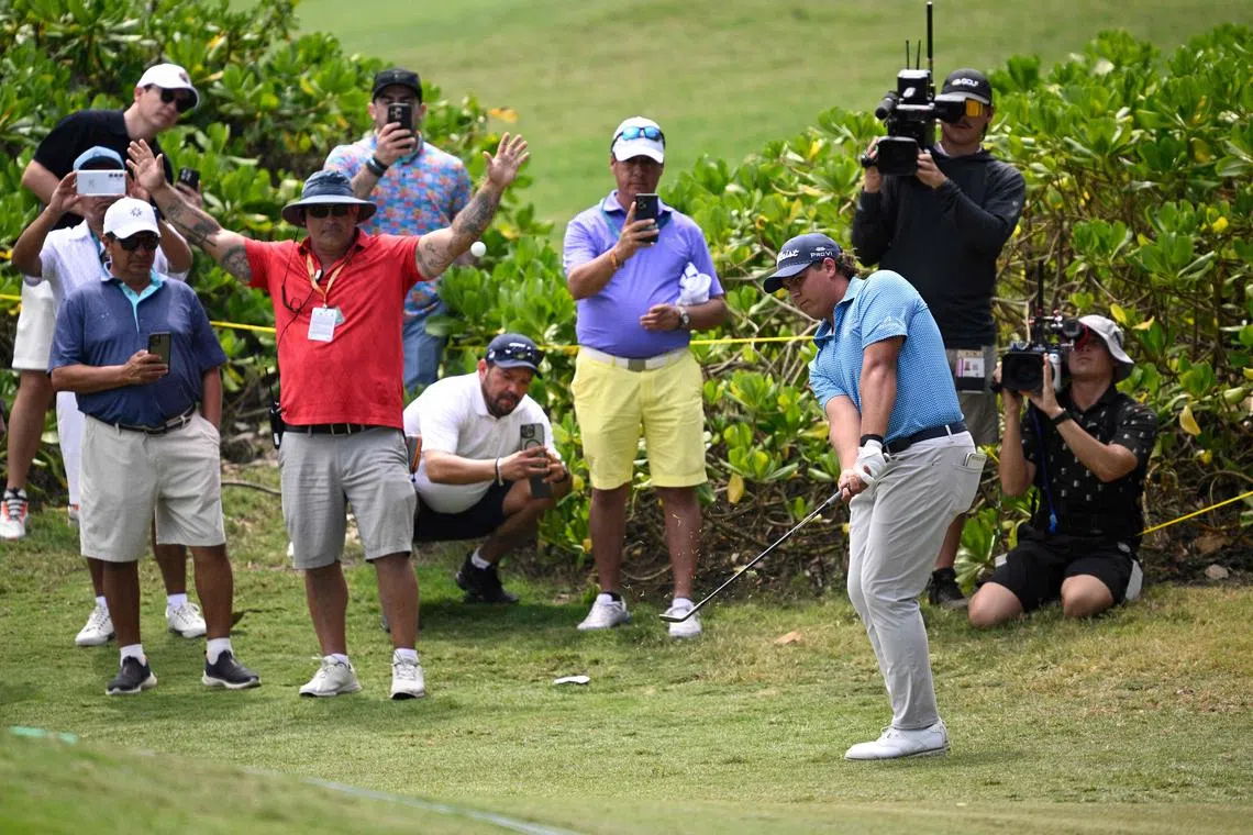 Aldrich Potgieter of South Africa plays a shot on the sixth hole during the third round of the Mexico Open.