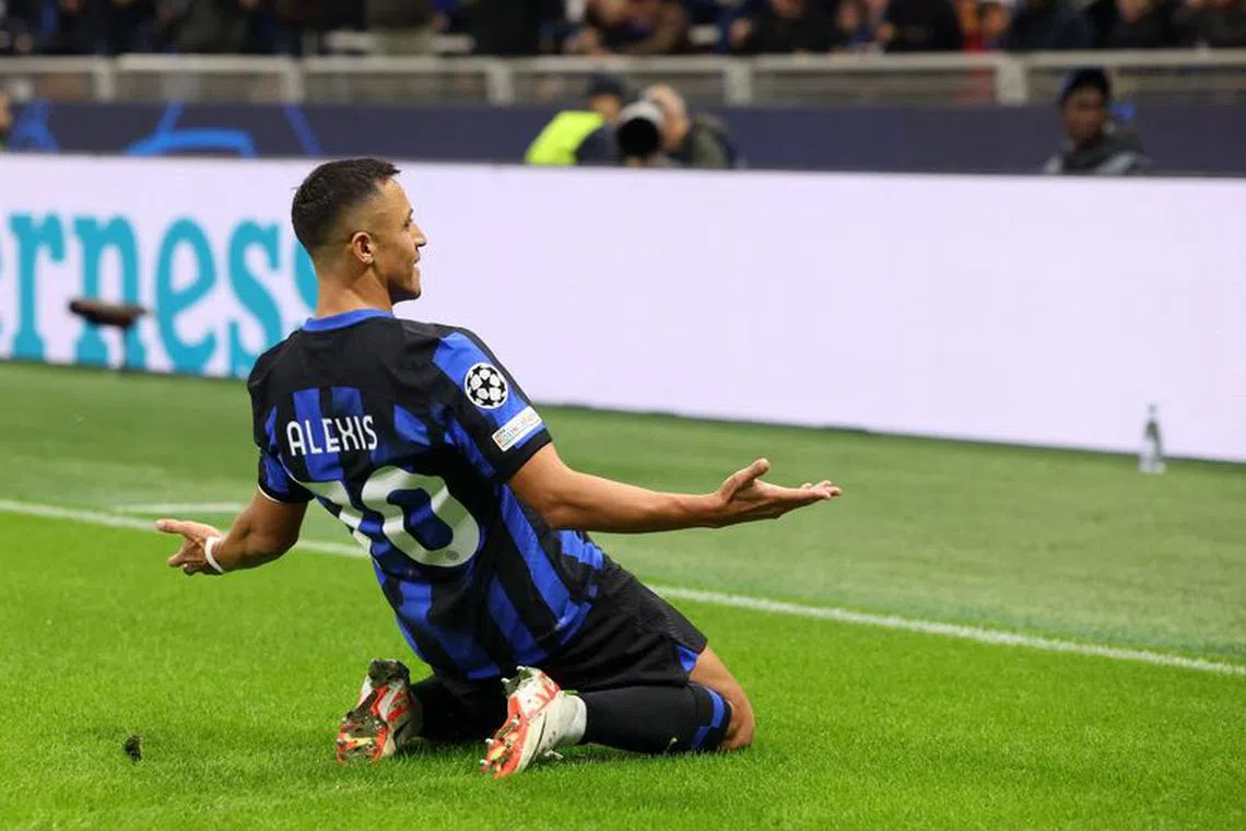 Soccer Football - Champions League - Group D - Inter Milan v FC Salzburg - San Siro, Milan, Italy - October 24, 2023 Inter Milan's Alexis Sanchez celebrates scoring their first goal REUTERS/Claudia Greco
