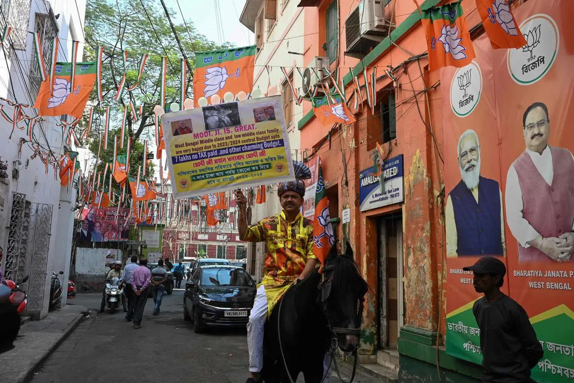 A Bharatiya Janata Party activist in support of India's PM Narendra Modi and the union budget, in Kolkata, on Feb 7, 2023.
