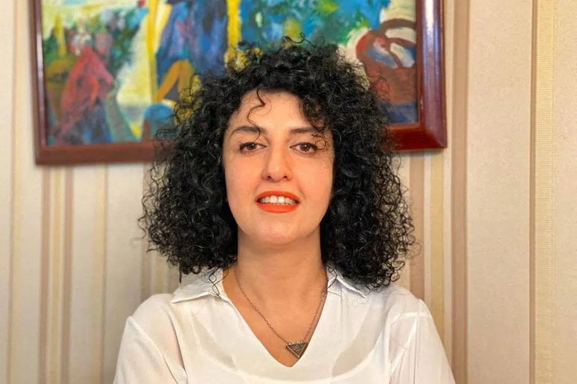 FILE PHOTO: Iranian human rights activist and the vice president of the Defenders of Human Rights Center (DHRC) Narges Mohammadi poses in this undated handout picture. Mohammadi family archive photos/Handout via REUTERS/File Photo