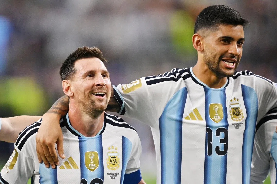 Soccer Football - FIFA World Cup 2026 - Group J - Argentina v Austria - Dallas Stadium, Arlington, Texas, U.S. - June 22, 2026 Argentina's Lionel Messi and Cristian Romero celebrate after the match IMAGN IMAGES via Reuters/Jerome Miron