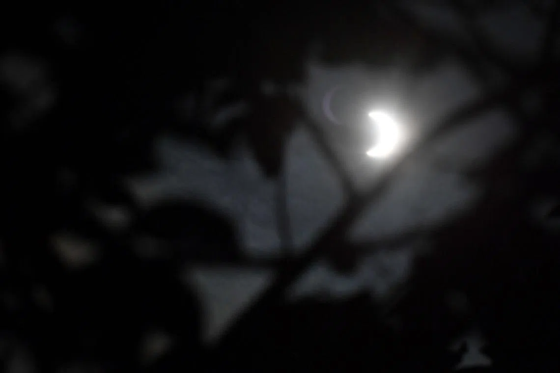 Partial solar eclipse at 1.43pm as viewed from Science Centre Singapore on Dec 26, 2019.  