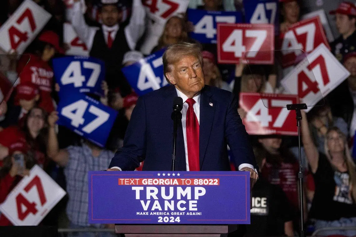 Former US President and Republican presidential candidate Donald Trump speaks during a campaign rally at the McCamish Pavilion in Atlanta, Georgia, October 28, 2024. (Photo by CHRISTIAN MONTERROSA / AFP)