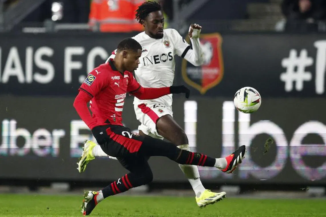 Soccer Football - Ligue 1 - Stade Rennes v OGC Nice - Roazhon Park, Rennes, France - January 13, 2024 OGC Nice's Evann Guessand in action with Stade Rennes' Warmed Omari REUTERS/Stephane Mahe/File photo