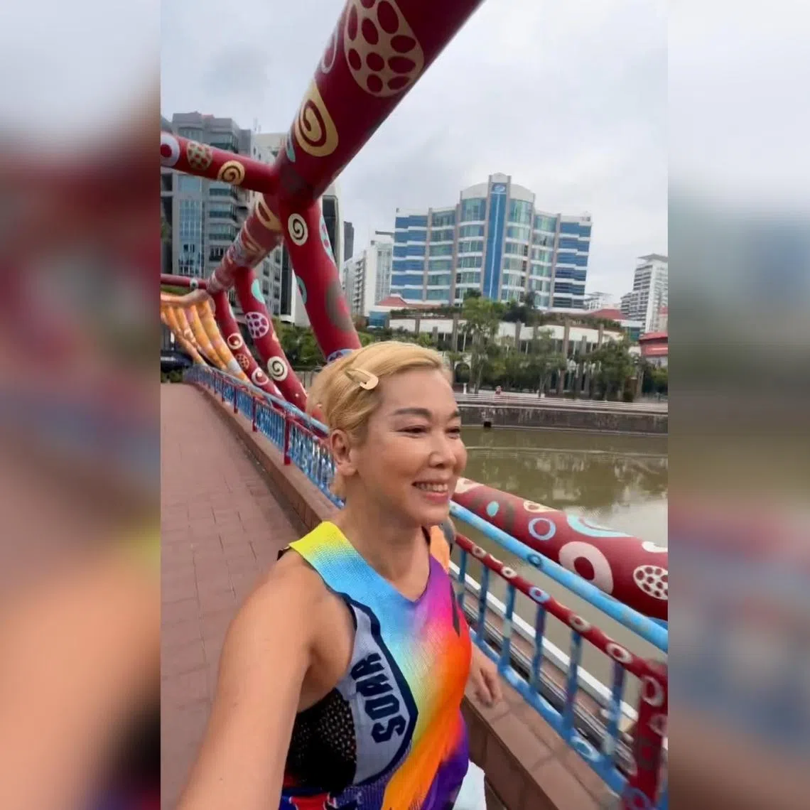 Singaporean host-actress Kym Ng running on Alkaff Bridge at Mohamed Sultan on a weekend.