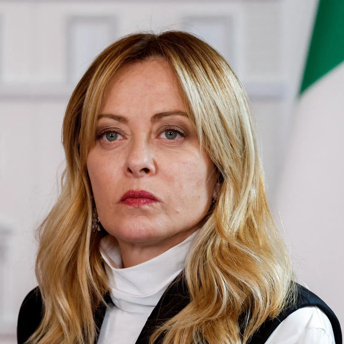 FILE PHOTO: Italy's Prime Minister Giorgia Meloni looks on during a joint statement with Kenya's President William Ruto (not pictured) at Chigi Palace, in Rome, Italy, April 20, 2026. REUTERS/Remo Casilli/File Photo
