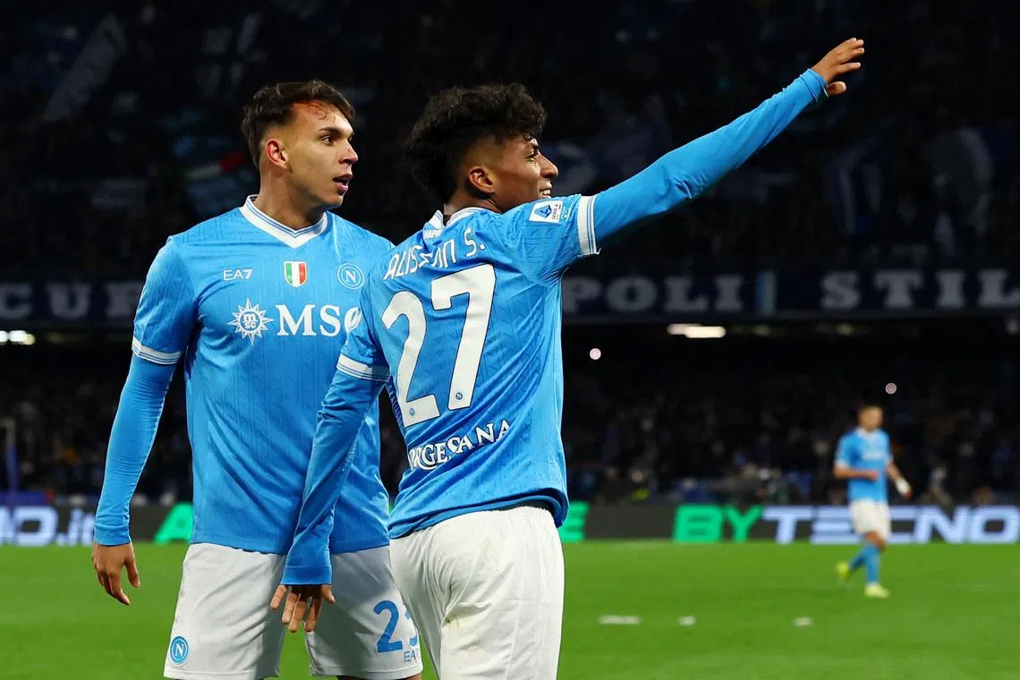 Soccer Football - Serie A - Napoli v AS Roma - Stadio Diego Armando Maradona, Naples, Italy - February 15, 2026 Napoli's Alisson Santos celebrates scoring their second goal with Giovane REUTERS/Ciro De Luca