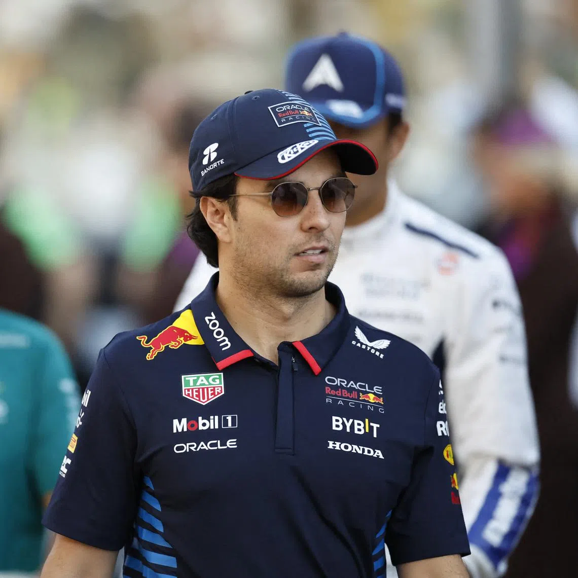 FILE PHOTO: Formula One F1 - Abu Dhabi Grand Prix - Yas Marina Circuit, Abu Dhabi, United Arab Emirates - December 8, 2024 Red Bull's Sergio Perez before the race REUTERS/Hamad I Mohammed/File Photo