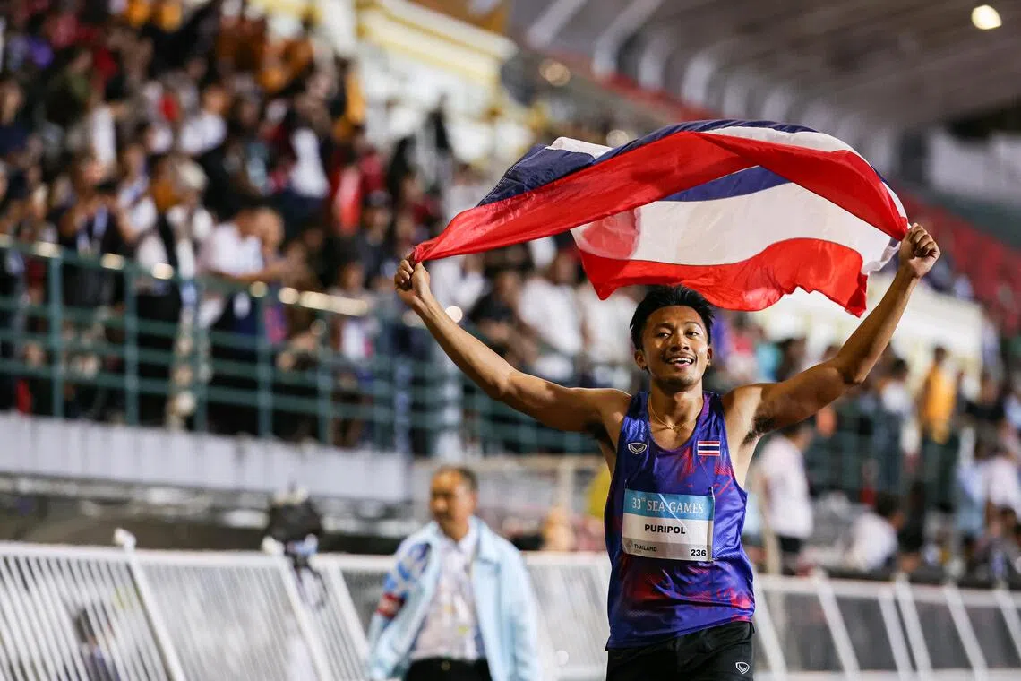 Thai sprinter Boonson Puripol celebrating after winning the 100m final at the SEA Games in Bangkok on Dec 11, 2025.