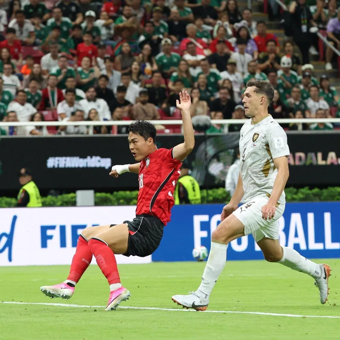 South Korea's Oh Hyeon-gyu (centre) scoring the team's second goal against the Czechs on June 11.