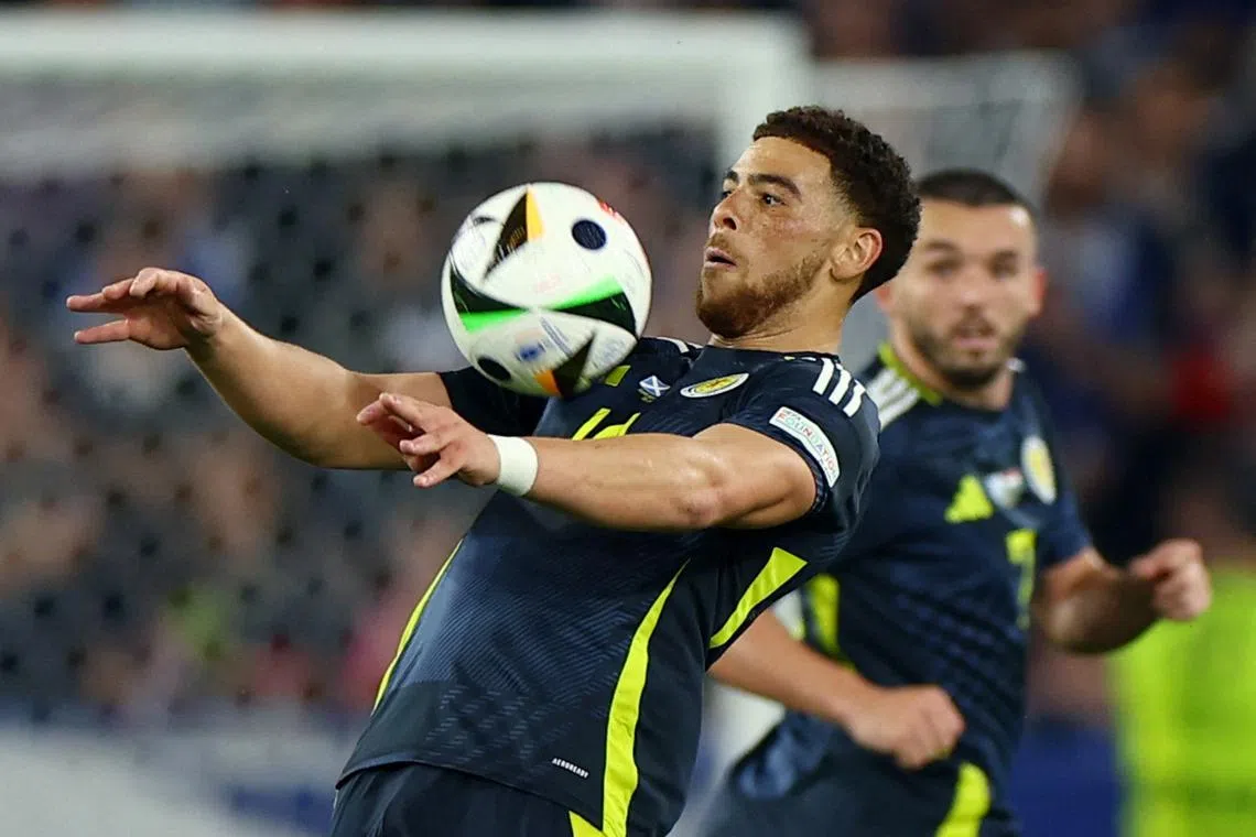 FILE PHOTO: Soccer Football - Euro 2024 - Group A - Scotland v Hungary - Stuttgart Arena, Stuttgart, Germany - June 23, 2024 Scotland's Che Adams in action REUTERS/Leonhard Simon/File Photo