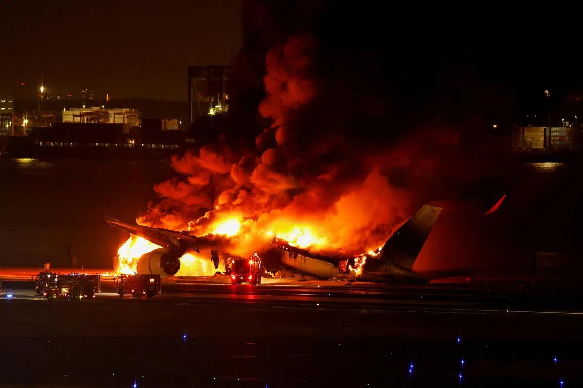 Japan Airlines' A350 airplane on fire at Haneda international airport in Tokyo, Japan January 2, 2024.