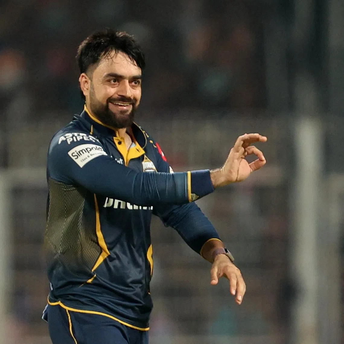 Cricket - Indian Premier League - IPL - Kolkata Knight Riders v Gujarat Titans - Eden Gardens, Kolkata, India - April 21, 2025 Gujarat Titans' Rashid Khan celebrates after taking the wicket of Kolkata Knight Riders' Sunil Narine REUTERS/Sahiba Chawdhary