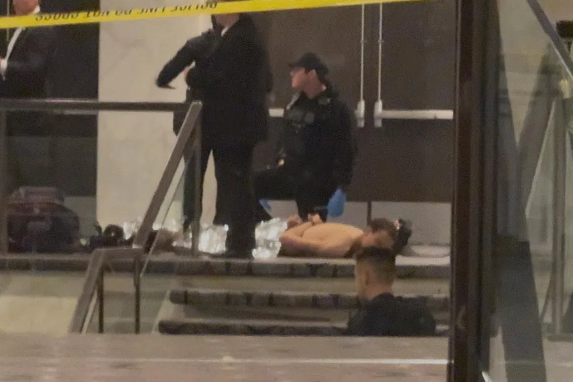 Cole Tomas Allen, a suspect in the shooting incident at the White House Correspondents' Association dinner, lies on the floor after being detained by law enforcement personnel, in Washington, D.C., U.S., April 25, 2026, in this screengrab from a video. Bill Frischling/ CQ Roll Call/Handout via REUTERS