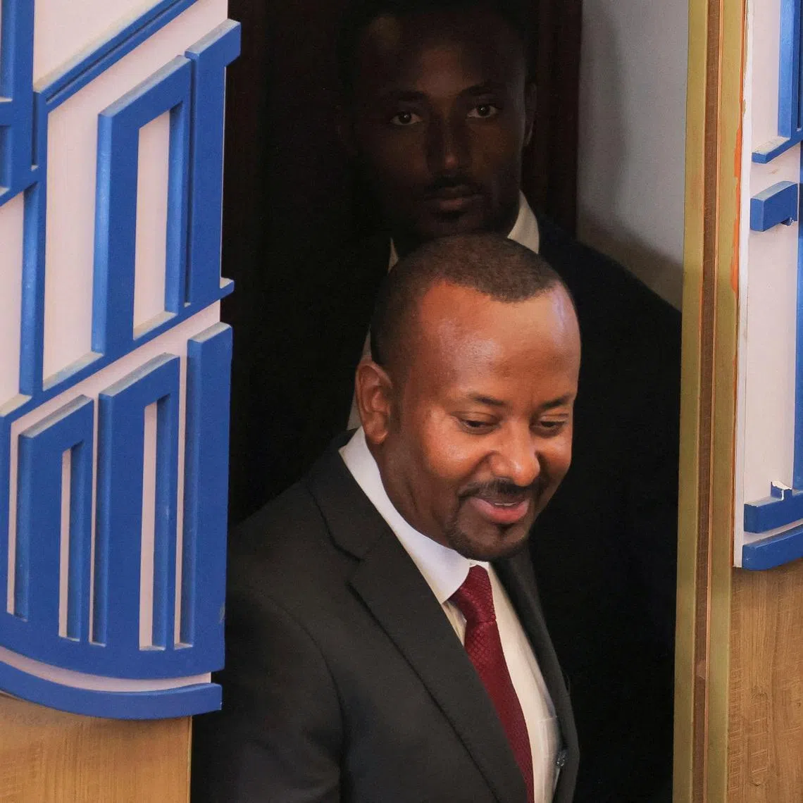 FILE PHOTO: Ethiopia's Prime Minister Abiy Ahmed arrives at the parliament to address parliament members on the current situation of the country, in Addis Ababa, Ethiopia, March 20, 2025. REUTERS/Tiksa Negeri/File Photo