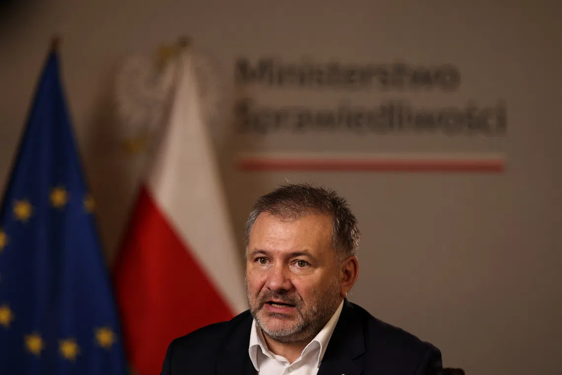 Polish Justice Minister Waldemar Zurek speaks during an interview with Reuters in Warsaw, Poland, December 11, 2025. REUTERS/Kuba Stezycki