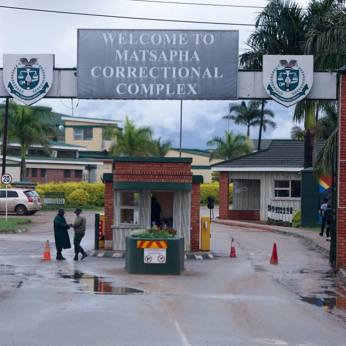 FILE PHOTO: Workers and visitors walk near the entrance to Matsapha Correctional Complex, a maximum-security prison known for holding high-profile detainees, near Manzini, Eswatini's second-largest city, April 23, 2026. REUTERS/Oupa Nkosi/File Photo