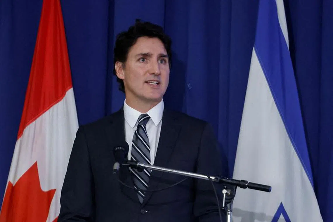 FILE PHOTO: Canadian Prime Minister Justin Trudeau makes remarks during a pro-Israel rally at the Soloway Jewish Community Centre in Ottawa, Ontario, Canada October 9, 2023. REUTERS/Blair Gable/File Photo