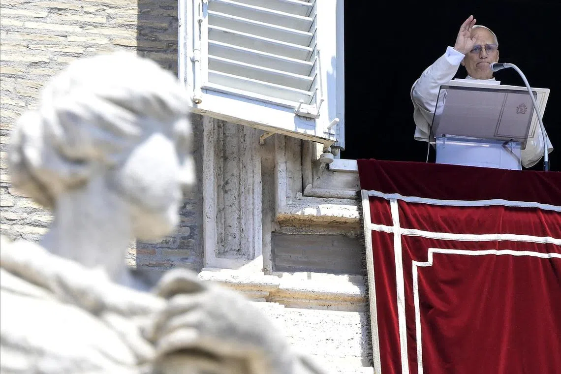 Pope Leo XIV delivering the Angelus prayer on July 6 from the window of his office overlooking Saint Peter's Square, in the Vatican City.