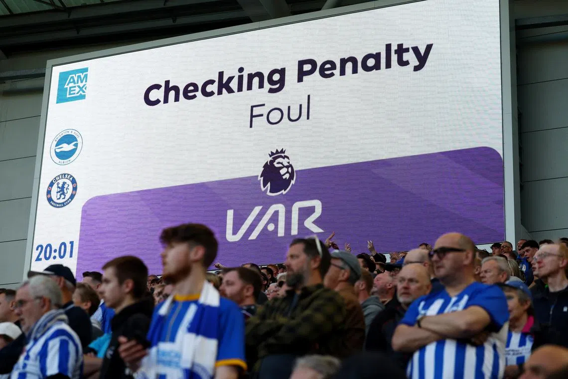 Soccer Football - Premier League - Brighton & Hove Albion v Chelsea - The American Express Community Stadium, Brighton, Britain - May 15, 2024 General view of the big screen during a VAR review before a penalty is overturned Action Images via Reuters/Paul Childs