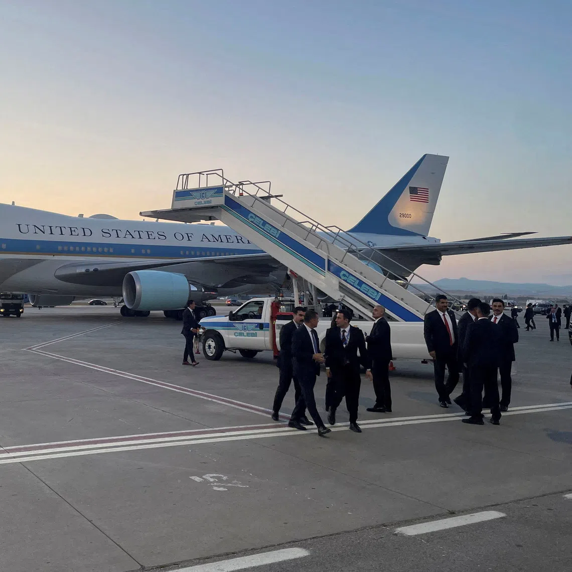A catering truck is parked on the other side of Air Force One on July 8, before US President Donald Trump’s departure from Ankara en route to Washington after his participation in the NATO leaders’ summit, at Ankara Esenboga Airport, Turkey.