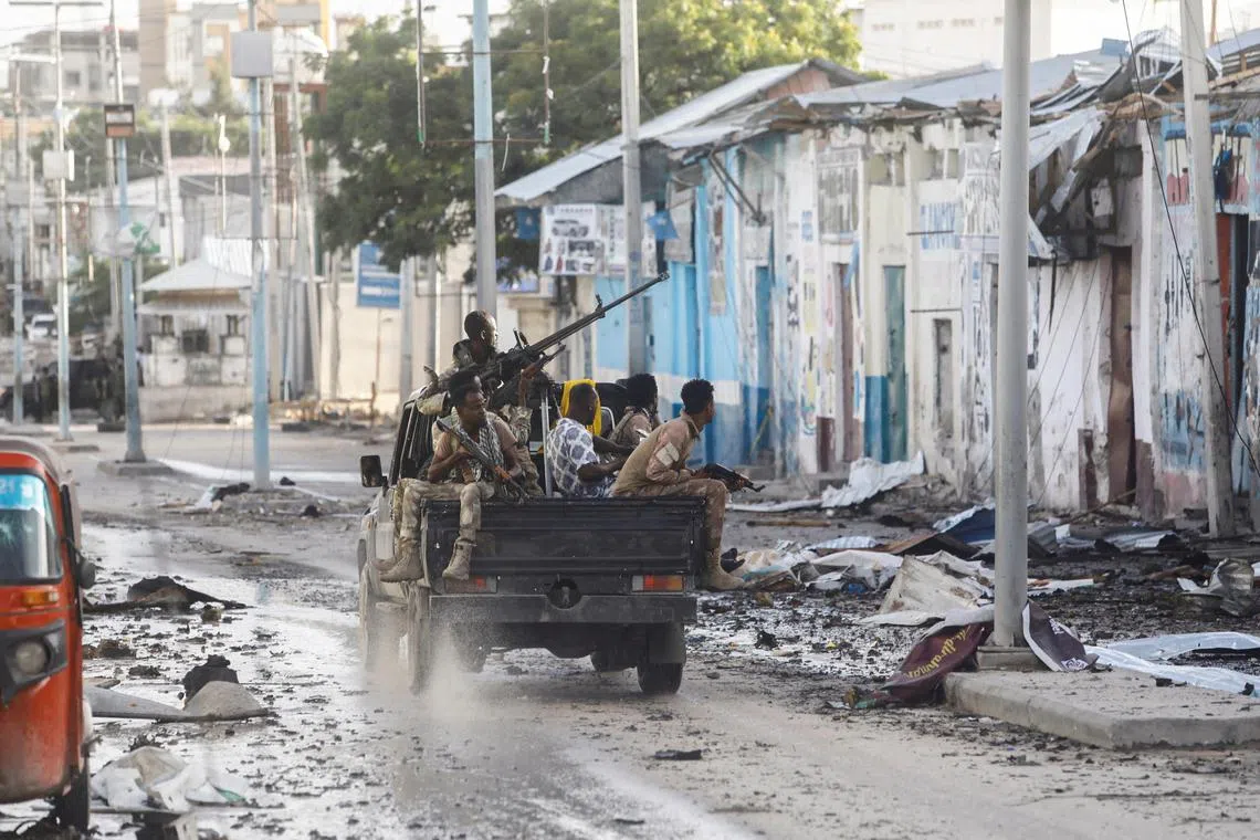 Somali security drive by Hotel Hayat, at an al Qaeda-linked al Shabaab militant attack in Mogadishu, Somalia, on Aug 20, 2022. 