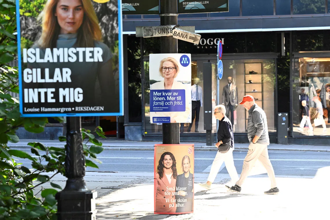 Sweden's ruling coalition trails in poll, but closes gap on centre-left opposition