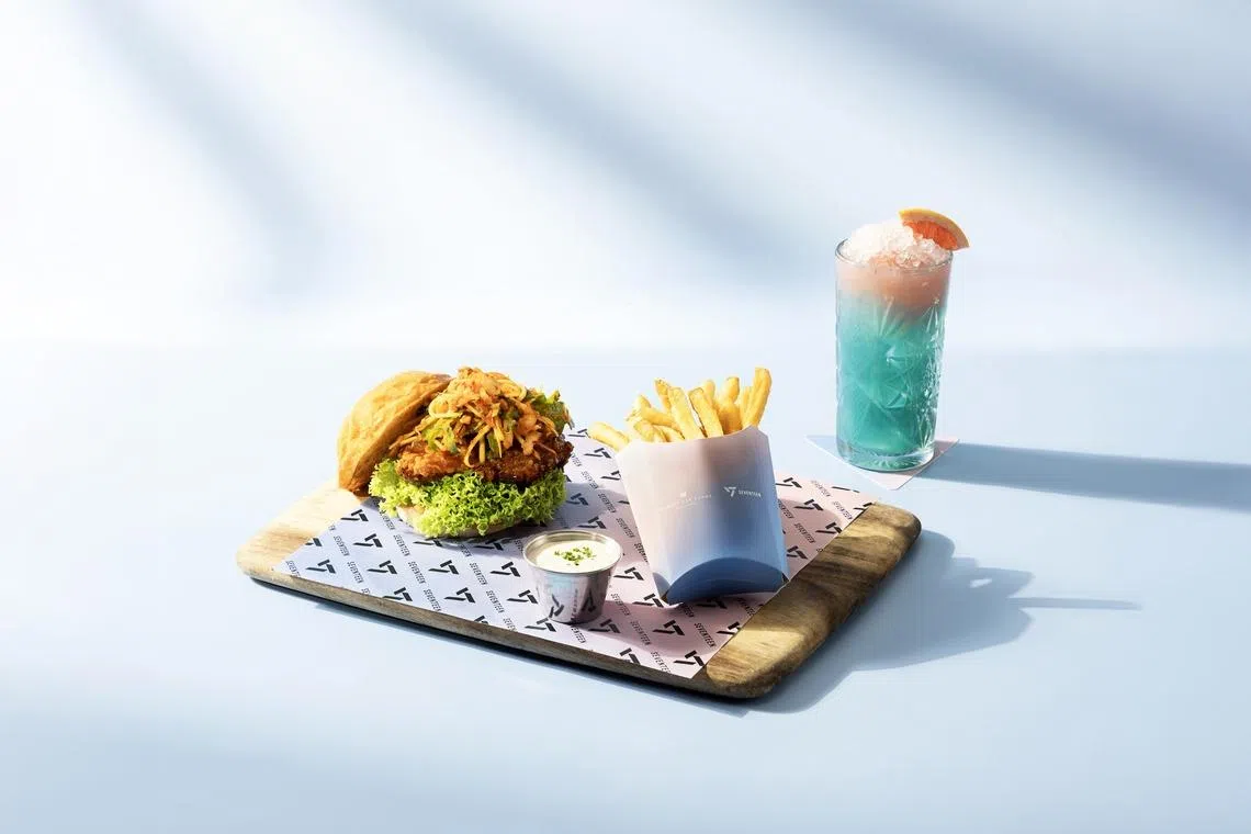 Yardbird Southern Table & Bar’s High Energy Bite Set features its K-Chicken Sandwich and its Serenity drink.