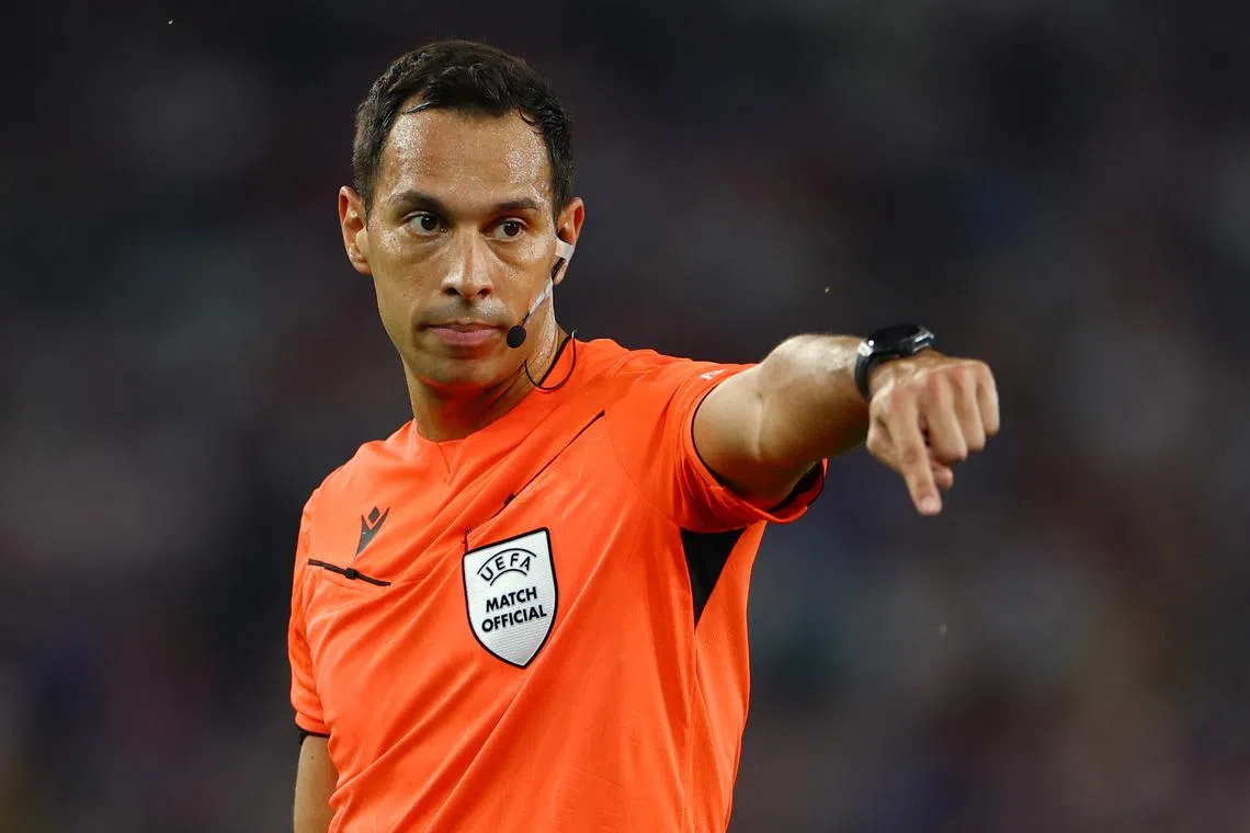 Soccer Football - Euro 2024 - Group A - Scotland v Hungary - Stuttgart Arena, Stuttgart, Germany - June 23, 2024 Referee Facundo Tello REUTERS/Leonhard Simon